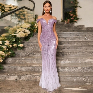 Detail view of purple sequined off-shoulder mermaid evening gown with shimmering texture