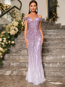 Detail of off-shoulder sequined evening gown with V-neckline and shimmering sparkles