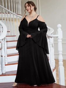 Detail of elegant plus size black off-shoulder gown with flared sleeves and deep V-neckline