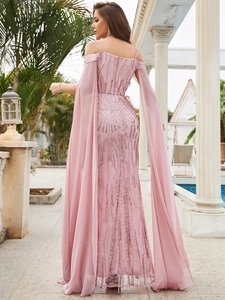 Detail of sequined long evening dress with off-shoulder chiffon shawl back view