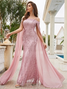 Detail of sequined off-shoulder evening dress with elegant cape sleeves and mermaid silhouette