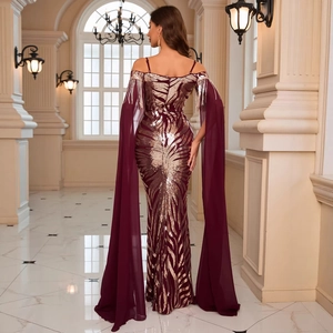 Elegant burgundy V-neck evening gown with golden sequins and long chiffon cape sleeves