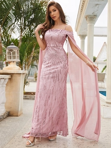 Detail of pink sequin evening gown featuring elegant cape sleeves and shimmering mesh texture