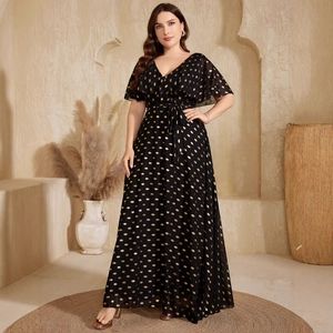 Elegant V-neck black maxi dress with gold polka dots and a waist tie for party wear