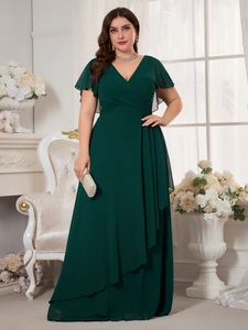 Detail of elegant dark green chiffon maxi dress with ruffled sleeves and V-neckline