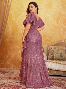 Detail view of purple sequin evening gown showing ruffle sleeves and shimmer fabric