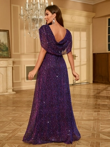 Detailed back view of a luxury purple sequin evening gown with a draped open back design