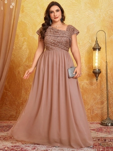 Detail of sequined bodice and pleated chiffon hem on elegant plus size evening gown