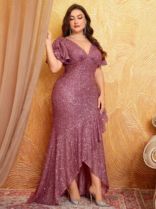 Detailed view of sequins on an elegant V-neck maxi dress with ruffled sleeves and hem