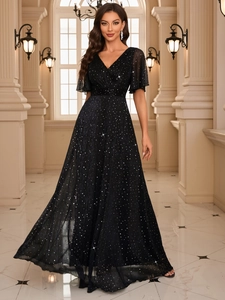 Close-up of elegant V-neck evening gown with shimmering sequins and flowing A-line skirt