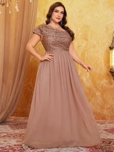 Detailed view of dust pink evening dress with sequin embroidery and pleated chiffon skirt