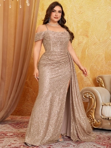 Detail of sequined champagne evening dress featuring a boned bodice and high slit