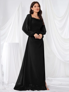 Detail view of square neck long lantern sleeves on an elegant black chiffon evening dress