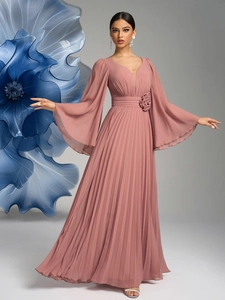 Detail of V-neck ruffled chiffon dress featuring flared sleeves and 3D floral waist decor