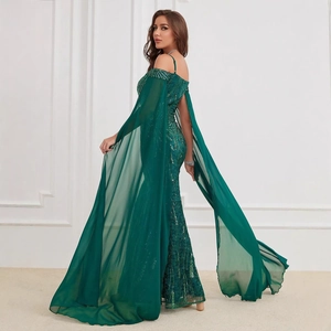Emerald green sequin evening gown with elegant chiffon cape sleeves and mermaid silhouette