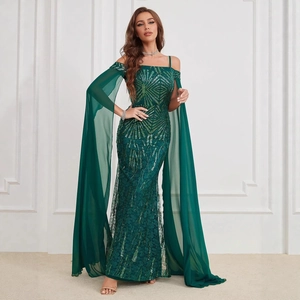 Elegant emerald green sequined evening gown with off-shoulder neckline and chiffon cape sleeves