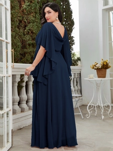 Close-up of navy blue plus size chiffon evening gown with elegant ruffled cape sleeves