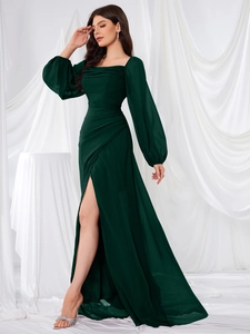 Detail view of square neck dark green chiffon evening dress with lantern sleeves and side slit