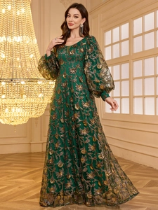 Elegant emerald green V-neck evening gown with floral sequin embroidery and puff sleeves