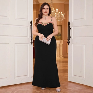 Elegant plus size black maxi dress with floral embroidery and chic shoulder straps