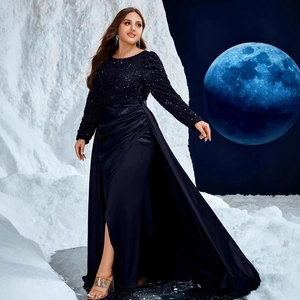 Midnight blue sequin and satin evening gown with long sleeves and side slit design