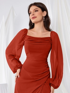 Detail of square neckline and draped waist on a rust orange chiffon bridesmaid dress