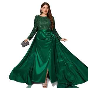 Elegant emerald green evening gown with sequined bodice and high-slit satin skirt