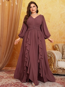 Detailed view of dark mauve chiffon maxi dress featuring lantern sleeves and ruffled hemline