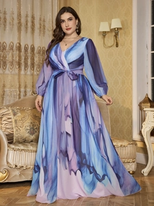 Detailed V-neck design and bow tie waist on long-sleeved marble print chiffon dress