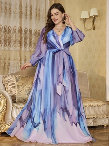 Close-up of V-neck chiffon maxi dress with blue watercolor print and waist tie detail