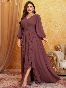 Detail of V-neck chiffon evening dress with lantern sleeves and ruffled hem design
