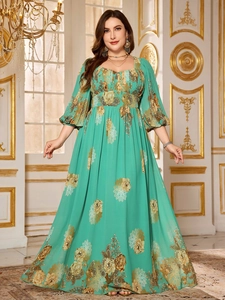 Detail of mint green plus size chiffon dress featuring floral print and lantern sleeves