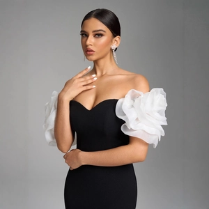 Elegant off-shoulder black slimming evening dress with large white 3D floral sleeves