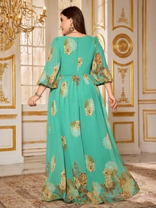 Detailed back view of mint green floral chiffon maxi dress with lantern sleeves