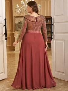 Detail of elegant sequined V-neck bodice and flowing rose-colored chiffon long dress