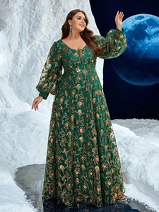 Elegant V-neck green evening gown with gold floral embroidery and sequin lantern sleeves