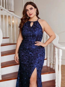 Detail of navy blue halter dress featuring sequins leaf embroidery and high slit