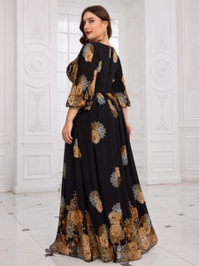 Detail of flared cuffs and elegant floral pattern on long chiffon plus size black dress