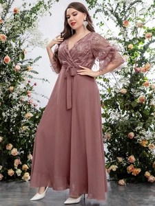 Detail of V-neck plus size chiffon dress with lace embroidery and sequins in dusty pink