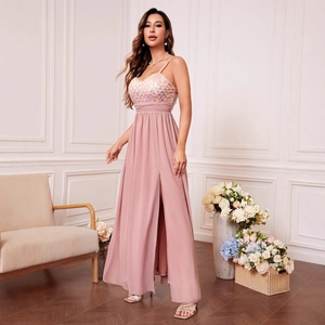 Pink sequined evening dress with thin straps and high slit flowing chiffon skirt