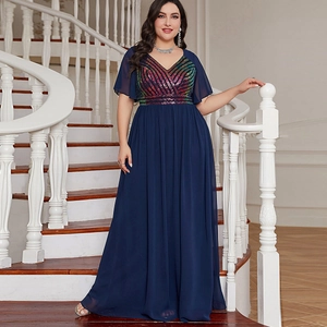 Detail of plus size navy V-neck dress with colorful sequins and chiffon skirt