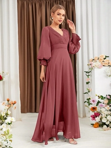 Detail view of V-neck dusty rose maxi dress with pleated bodice and elastic ruffled cuffs