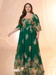 Detailed view of the dark green floral print chiffon dress with elegant puff sleeves