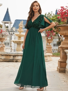 Close-up of elegant V-neck evening gown featuring sequins and slit short sleeves