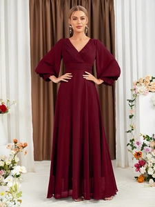 Detailed view of burgundy maxi dress featuring elegant V-neck and puff lantern sleeves