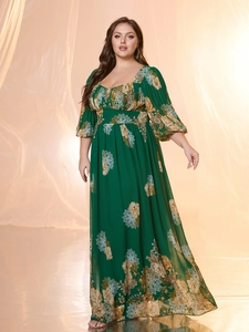 Detail view of forest green chiffon maxi dress with vintage yellow floral print patterns