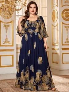 Detailed close-up of plus size floral chiffon dress featuring lantern sleeves and elegant print