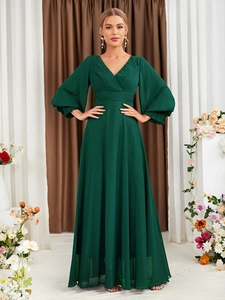 Detail of elegant V-neck long sleeve floor-length evening dress in deep green chiffon