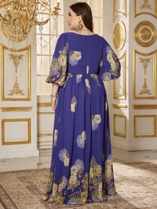 Detail of elegant navy blue floral chiffon maxi dress with long lantern sleeves and high waist