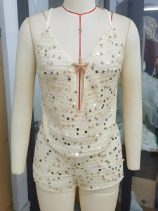 Sequin mesh beach set with halter top and shorts featuring a gold starfish detail